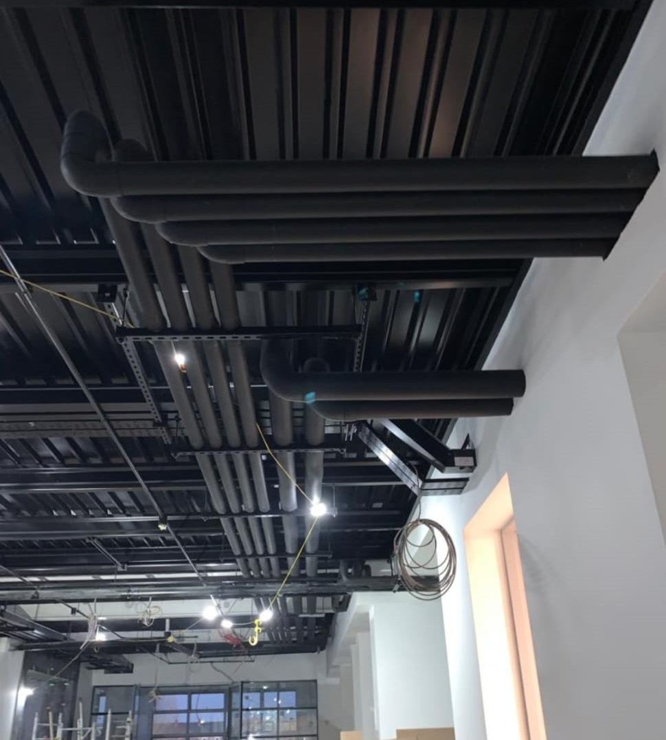 Factory pipes with black insulation