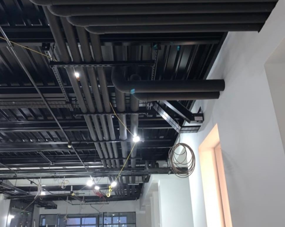 Factory pipes with black insulation